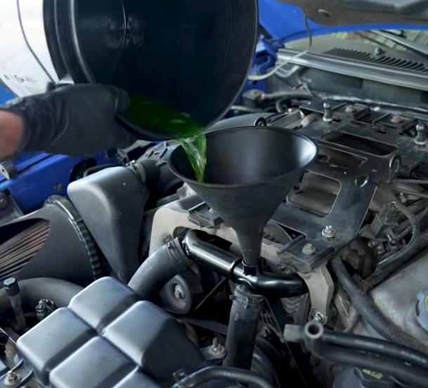1996-2004-mustang-4v-46-replacement-coolant-crossover-tube-install-instructions_efea6523.jpg (609&times;552)